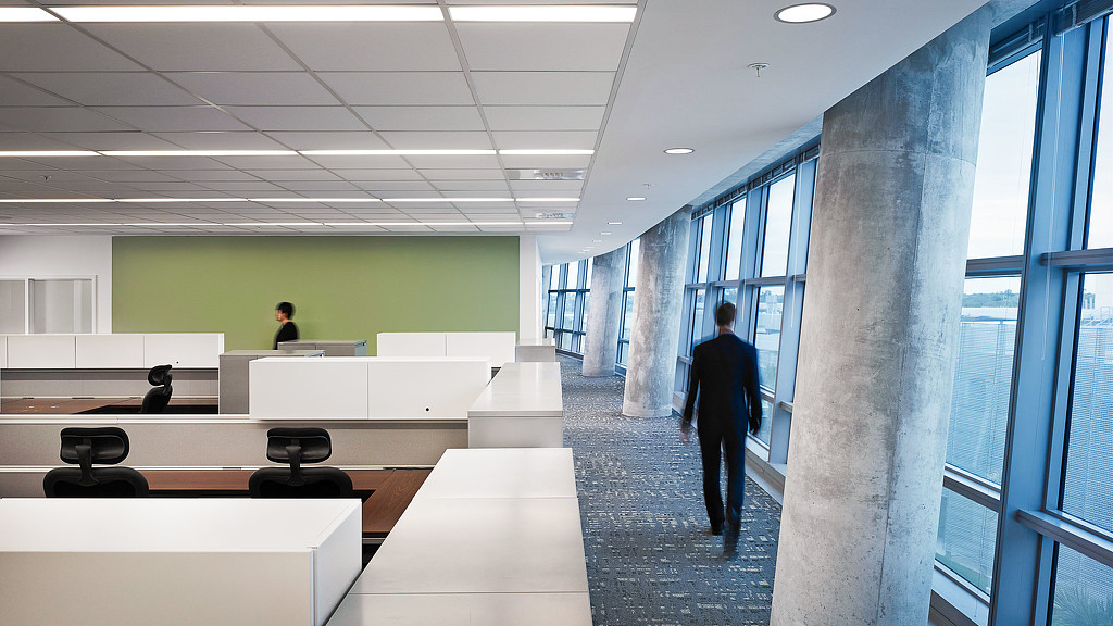 A man and a woman in an office.